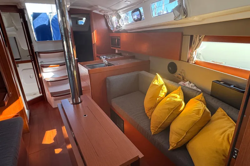 Viento Yacht Photos Pics Interior of 2018 Beneteau Oceanis 35.1 yacht with cozy seating and modern kitchen.