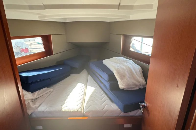 Viento Yacht Photos Pics Interior cabin of 2018 Beneteau Oceanis 35.1 sailboat with cozy bedding.