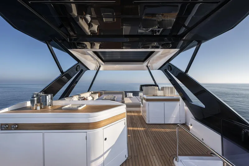  Yacht Photos Pics Luxurious 2024 Ferretti Yachts 720 flybridge with elegant teak decking and modern design.