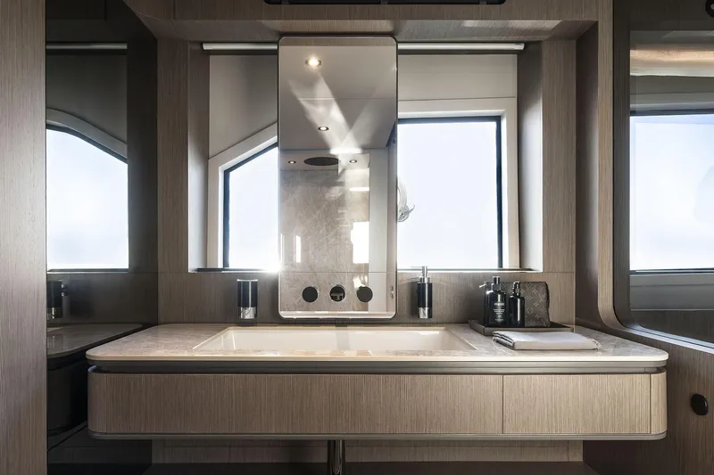  Yacht Photos Pics Luxurious bathroom interior of 2024 Ferretti Yachts 720, featuring modern design and elegant fixtures.