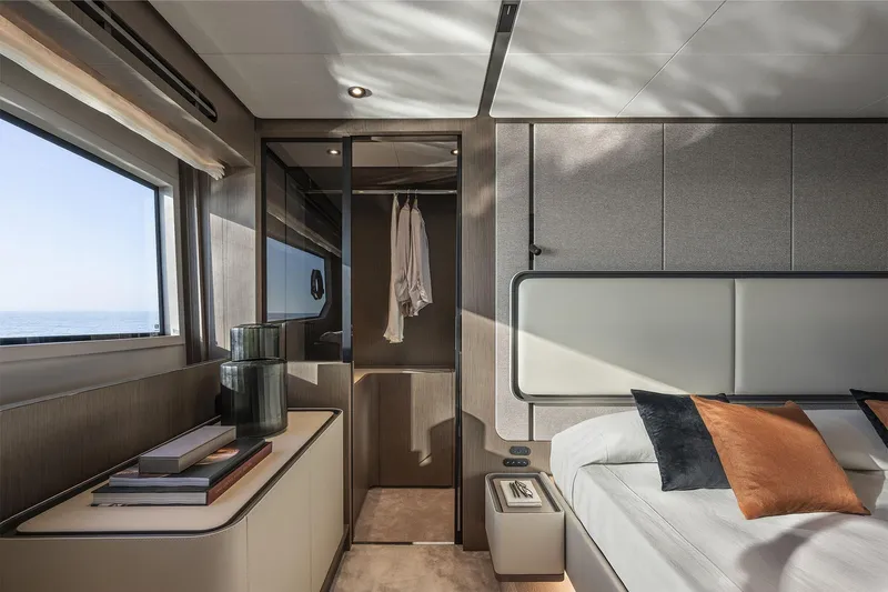  Yacht Photos Pics Luxurious interior of 2024 Ferretti Yachts 720, featuring elegant bedroom design.