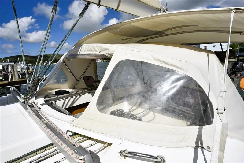  Yacht Photos Pics Beneteau Oceanis 473 sailboat cockpit, 2002 model, docked at harbor.