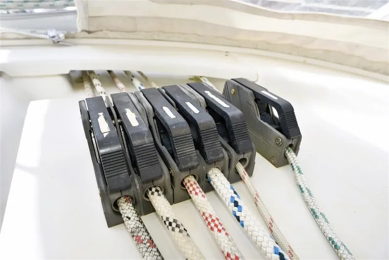  Yacht Photos Pics Close-up of rope clutches on a 2002 Beneteau Oceanis 473 yacht.