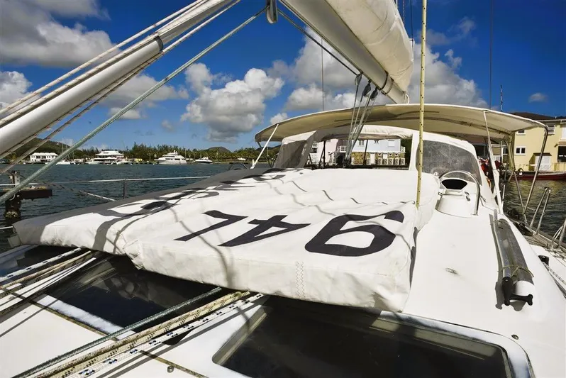  Yacht Photos Pics Beneteau Oceanis 473 sailboat, 2002 model, docked in sunny harbor.