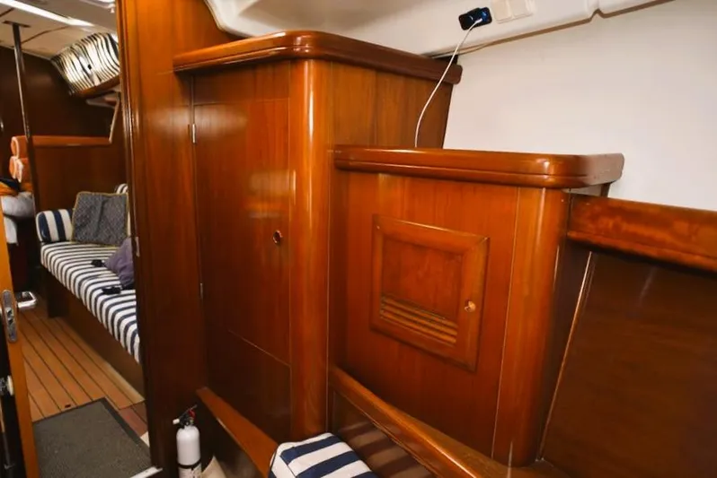  Yacht Photos Pics Interior of 2002 Beneteau Oceanis 473 yacht with wooden furnishings.