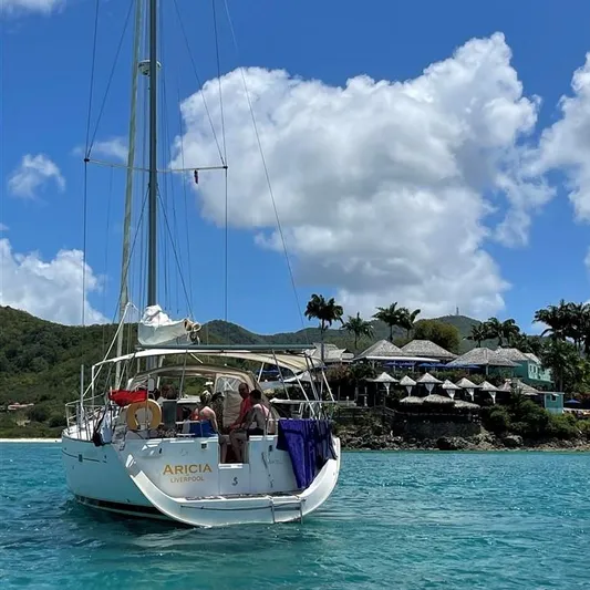  Yacht Photos Pics Beneteau Oceanis 473 sailboat near tropical coast, year 2002.