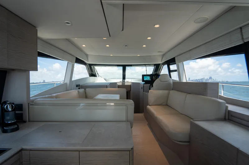 Avanti Yacht Photos Pics Luxurious interior of 2022 Ferretti Yachts 500 with modern seating and ocean view.