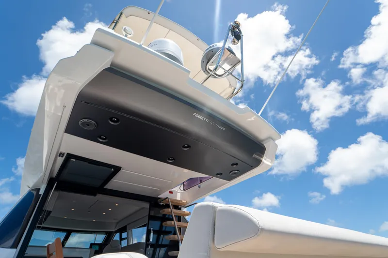 Avanti Yacht Photos Pics 2022 Ferretti Yachts 500, luxury yacht exterior against a bright blue sky.