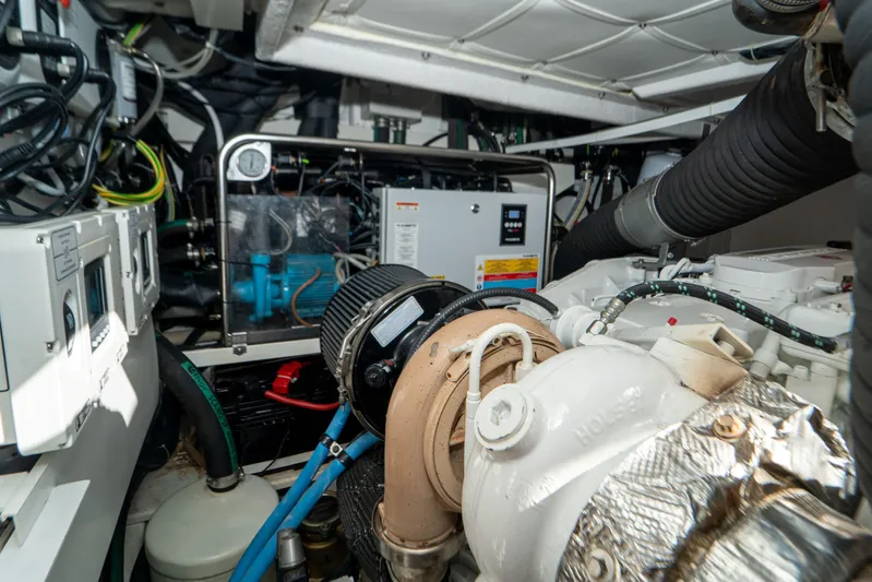 Avanti Yacht Photos Pics Engine room of 2022 Ferretti Yachts 500, showcasing mechanical components and wiring.