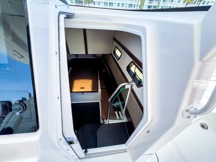 Yacht Photos Pics Interior cabin view of 2025 Edgewater 370CC boat, featuring modern design and sleek finishes.