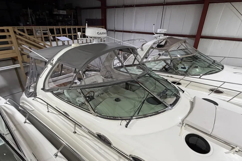 Good Juju Yacht Photos Pics 2005 Sea Ray 360 Sundancer yacht in storage, featuring sleek design and covered cockpit.