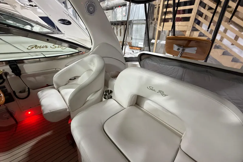 Good Juju Yacht Photos Pics 2005 Sea Ray 360 Sundancer interior with white leather seating and elegant design.
