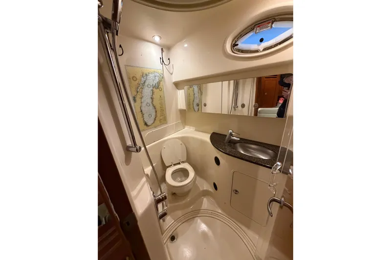 Good Juju Yacht Photos Pics 2005 Sea Ray 360 Sundancer bathroom with shower, sink, and toilet.