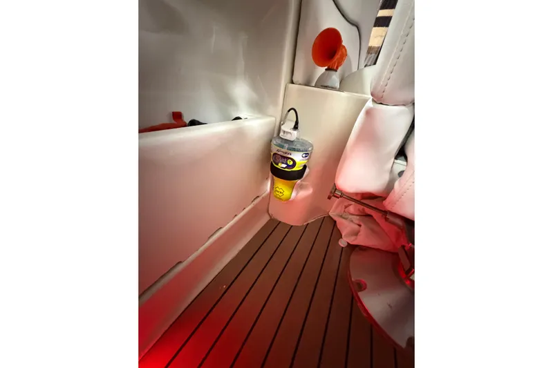 Good Juju Yacht Photos Pics 2005 Sea Ray 360 Sundancer interior with safety equipment and wooden flooring.