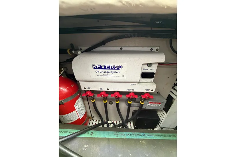 Good Juju Yacht Photos Pics Engine room of 2005 Sea Ray 360 Sundancer with Reverso oil change system.