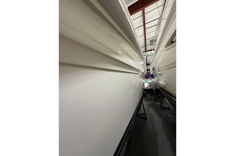 Good Juju Yacht Photos Pics 2005 Sea Ray 360 Sundancer yacht in storage, showcasing sleek hull design.