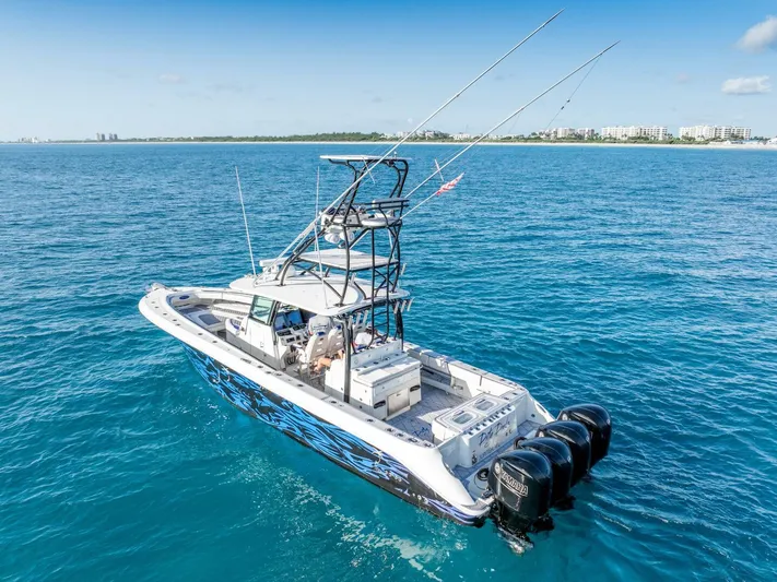 Dirty Deeds Yacht Photos Pics 2014 Hydra-Sports 42 Custom Siesta boat on open water, featuring multiple outboard engines.