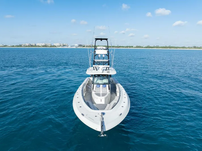 Dirty Deeds Yacht Photos Pics 2014 Hydra-Sports 42 Custom Siesta boat on calm blue water.