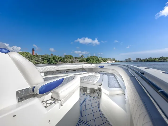 Dirty Deeds Yacht Photos Pics 2014 Hydra-Sports 42 Custom Siesta boat interior with luxurious seating on a sunny day.