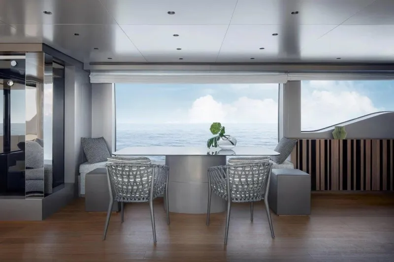  Yacht Photos Pics Luxurious interior of 2021 Sanlorenzo SL90A yacht with ocean view and modern seating.