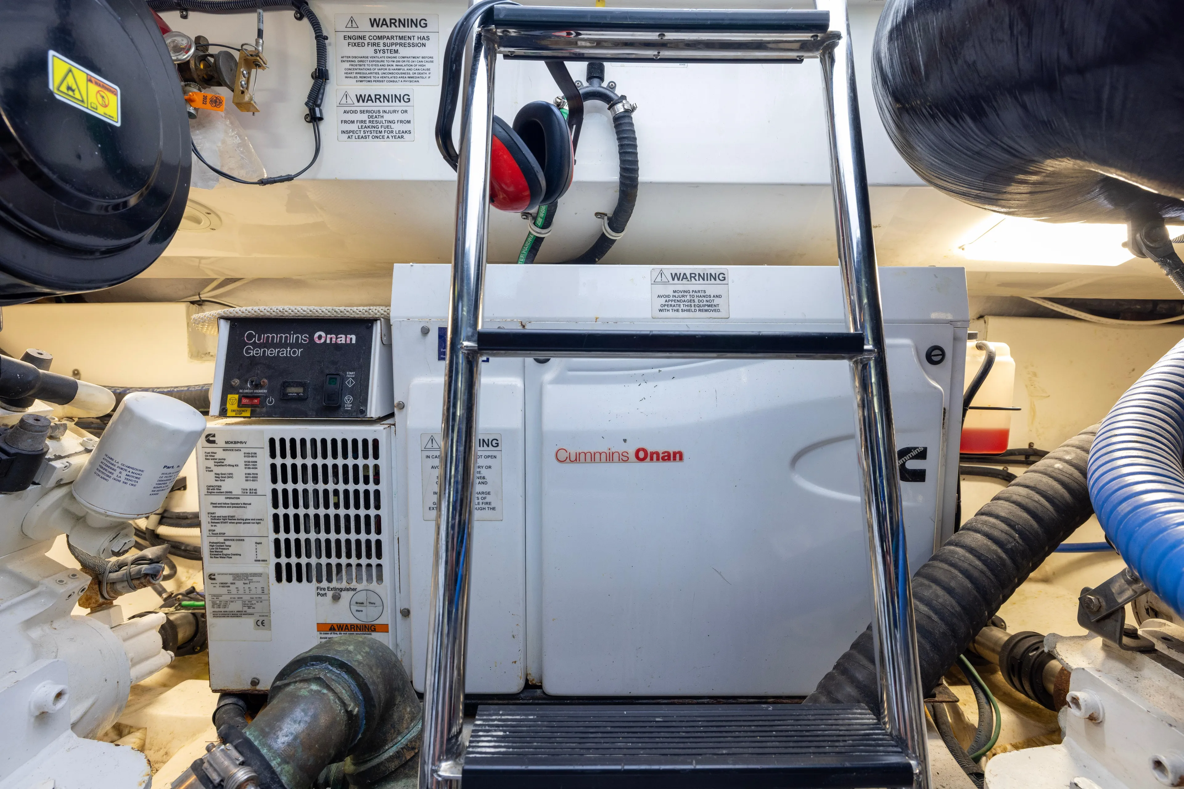  Yacht Photos Pics Engine room of 2012 Cabo 44 Hardtop Express with Cummins Onan generator.