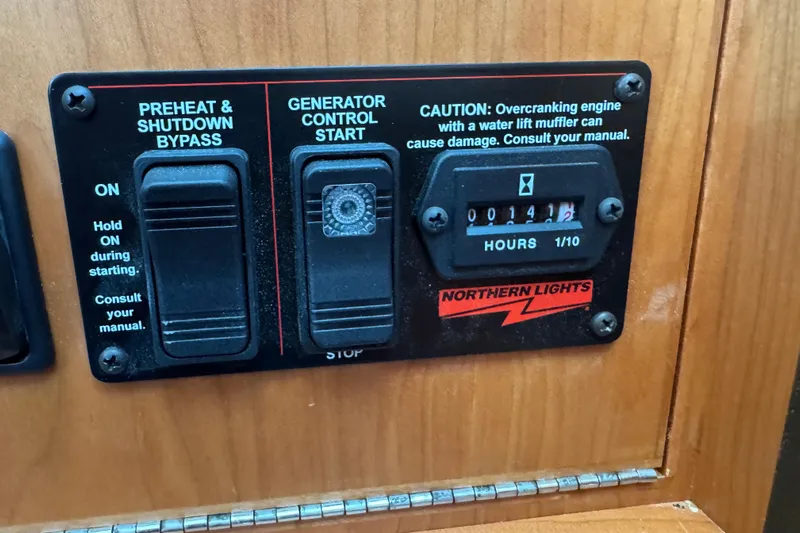 Dot's Deal Yacht Photos Pics Control panel of a 2023 Sabre 48 Salon Express with generator hour meter.