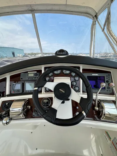  Yacht Photos Pics Steering wheel and dashboard of 2006 Carver 38 Super Sport yacht.