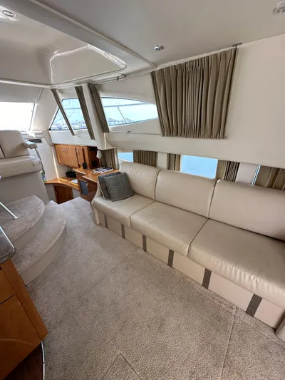  Yacht Photos Pics Luxurious interior of a 2006 Carver 38 Super Sport yacht with beige seating.