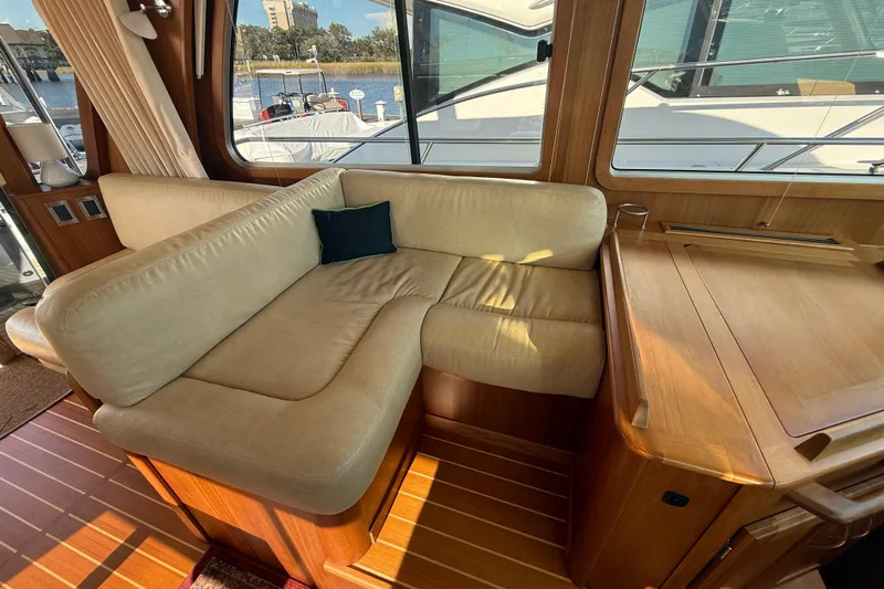 Haggis Xx Yacht Photos Pics Interior of 2017 Sabre 48 Salon Express with beige seating and wooden accents.
