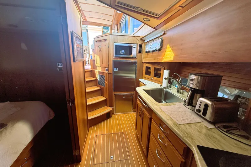 Haggis Xx Yacht Photos Pics Luxurious 2017 Sabre 48 Salon Express yacht interior with modern kitchen amenities.