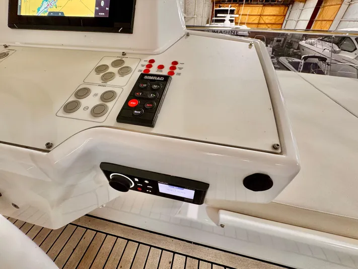 Time To Fly Yacht Photos Pics Control panel of 2022 Ferretti Yachts 550 with navigation and communication systems.