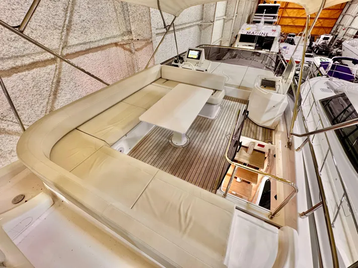 Time To Fly Yacht Photos Pics Luxurious 2022 Ferretti Yachts 550 interior with elegant seating and modern design.