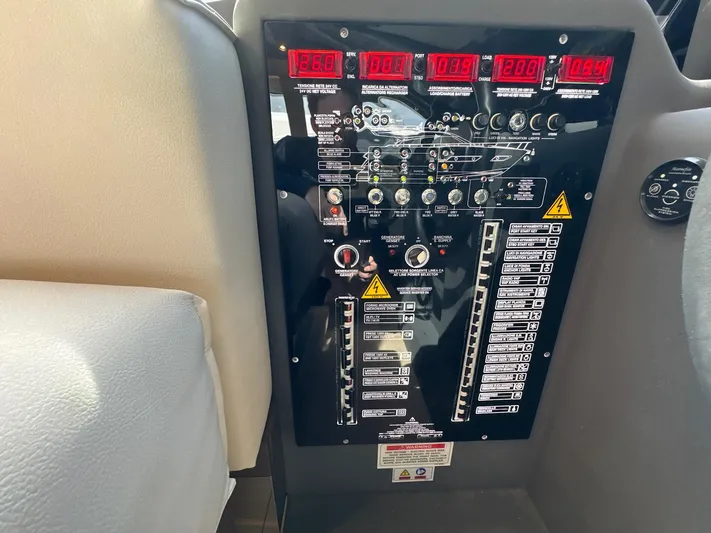 Time To Fly Yacht Photos Pics Control panel of a 2022 Ferretti Yachts 550, featuring digital displays and switches.