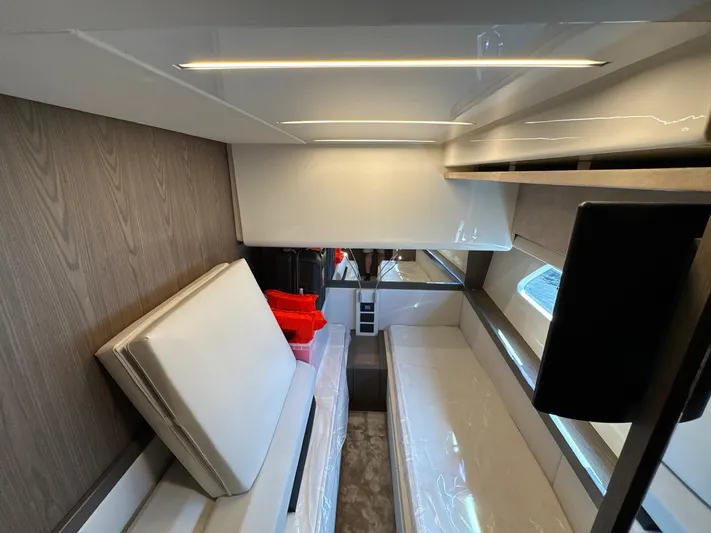 Time To Fly Yacht Photos Pics Interior of 2022 Ferretti Yachts 550, featuring modern seating and sleek design elements.