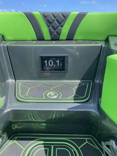  Yacht Photos Pics 2020 Midnight Express Open 43 boat interior with green accents and digital display.