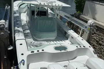  Yacht Photos Pics 2021 Yellowfin 39 boat docked, featuring sleek design and spacious deck.