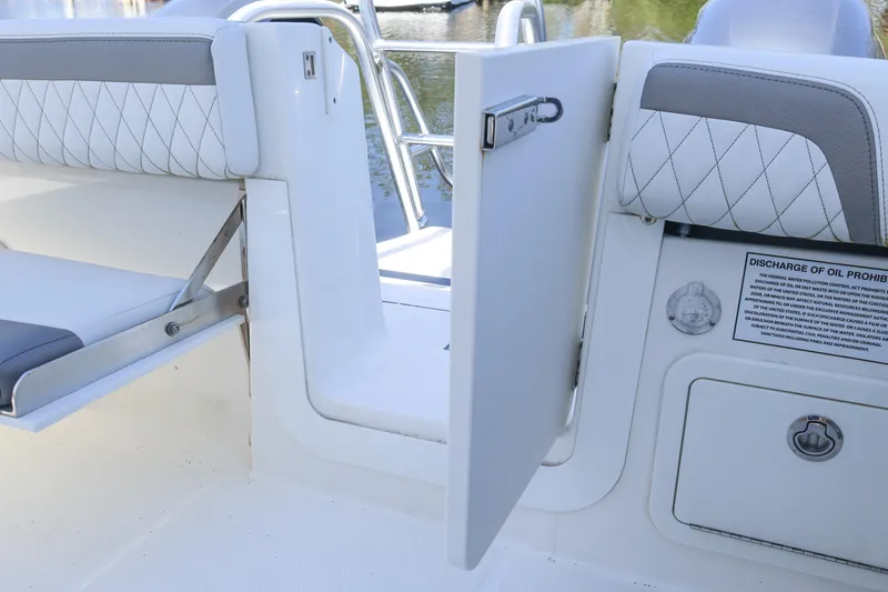  Yacht Photos Pics 2022 World Cat 280 CC-X boat interior with open door and seating area.