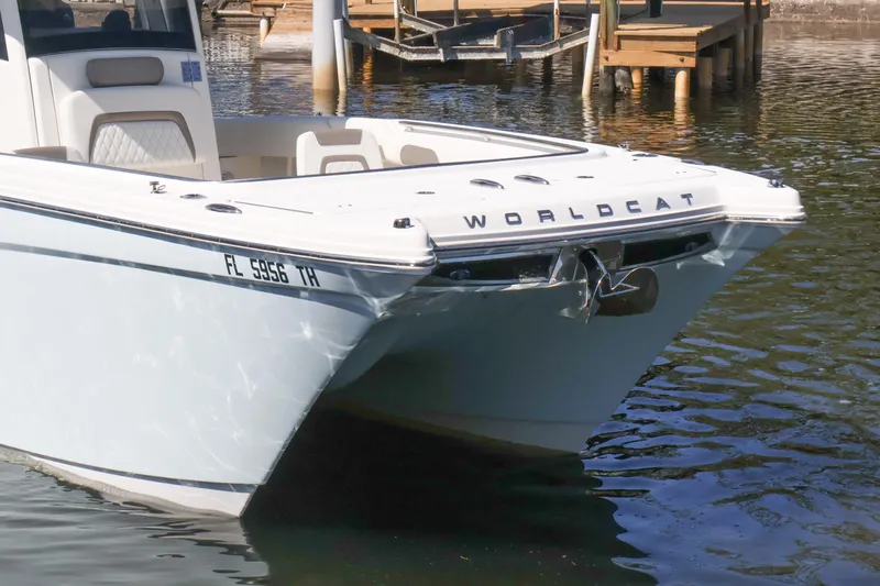  Yacht Photos Pics 2022 World Cat 280 CC-X boat docked on calm water.