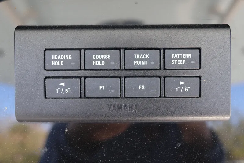  Yacht Photos Pics Control panel of a 2022 World Cat 280 CC-X boat with navigation buttons.