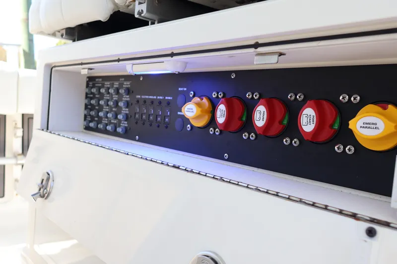  Yacht Photos Pics Control panel of 2022 World Cat 280 CC-X boat with switches and dials.