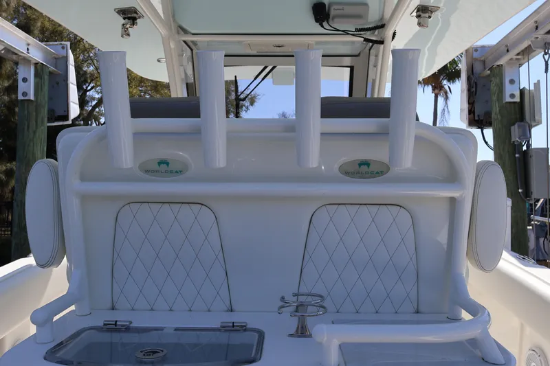  Yacht Photos Pics 2022 World Cat 280 CC-X boat interior with rod holders and storage compartments.