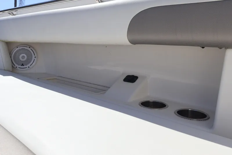  Yacht Photos Pics 2022 World Cat 280 CC-X boat interior with speaker and cup holders.