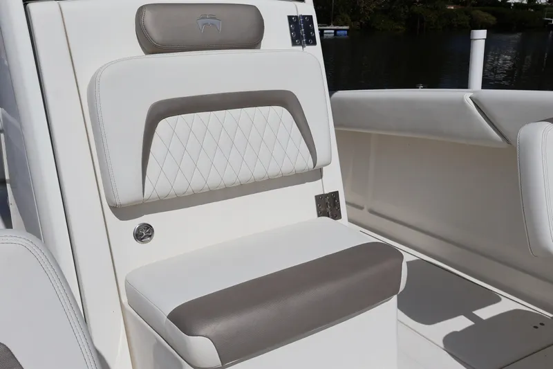  Yacht Photos Pics Luxurious seating on 2022 World Cat 280 CC-X boat, featuring elegant upholstery design.