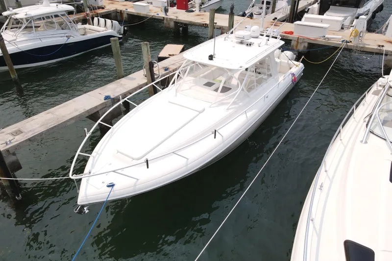  Yacht Photos Pics 2010 Intrepid 390 Sport Yacht docked at marina, aerial view.