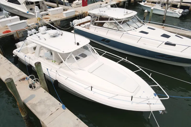  Yacht Photos Pics 2010 Intrepid 390 Sport Yacht docked at marina, aerial view.