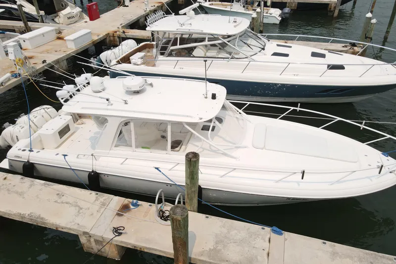  Yacht Photos Pics 2010 Intrepid 390 Sport Yacht docked at marina, aerial view.