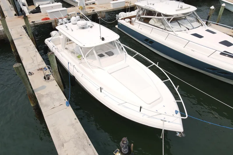  Yacht Photos Pics 2010 Intrepid 390 Sport Yacht docked at marina, aerial view.