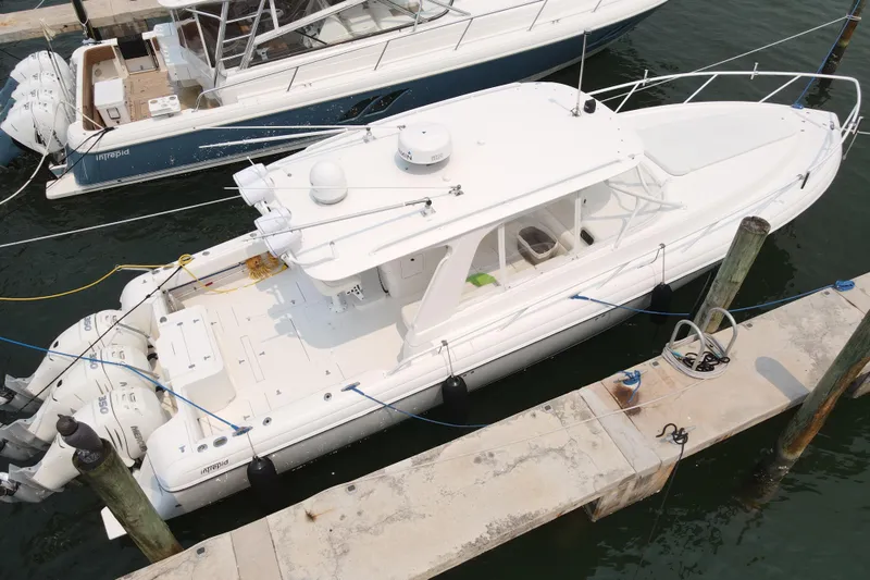  Yacht Photos Pics 2010 Intrepid 390 Sport Yacht docked at marina, aerial view.