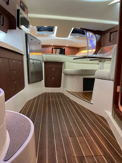  Yacht Photos Pics Interior of 2022 Grady-White Express 370 boat with wood flooring and modern amenities.