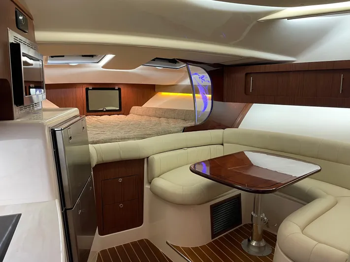  Yacht Photos Pics Luxurious interior of 2022 Grady-White Express 370 boat with modern amenities and elegant design.